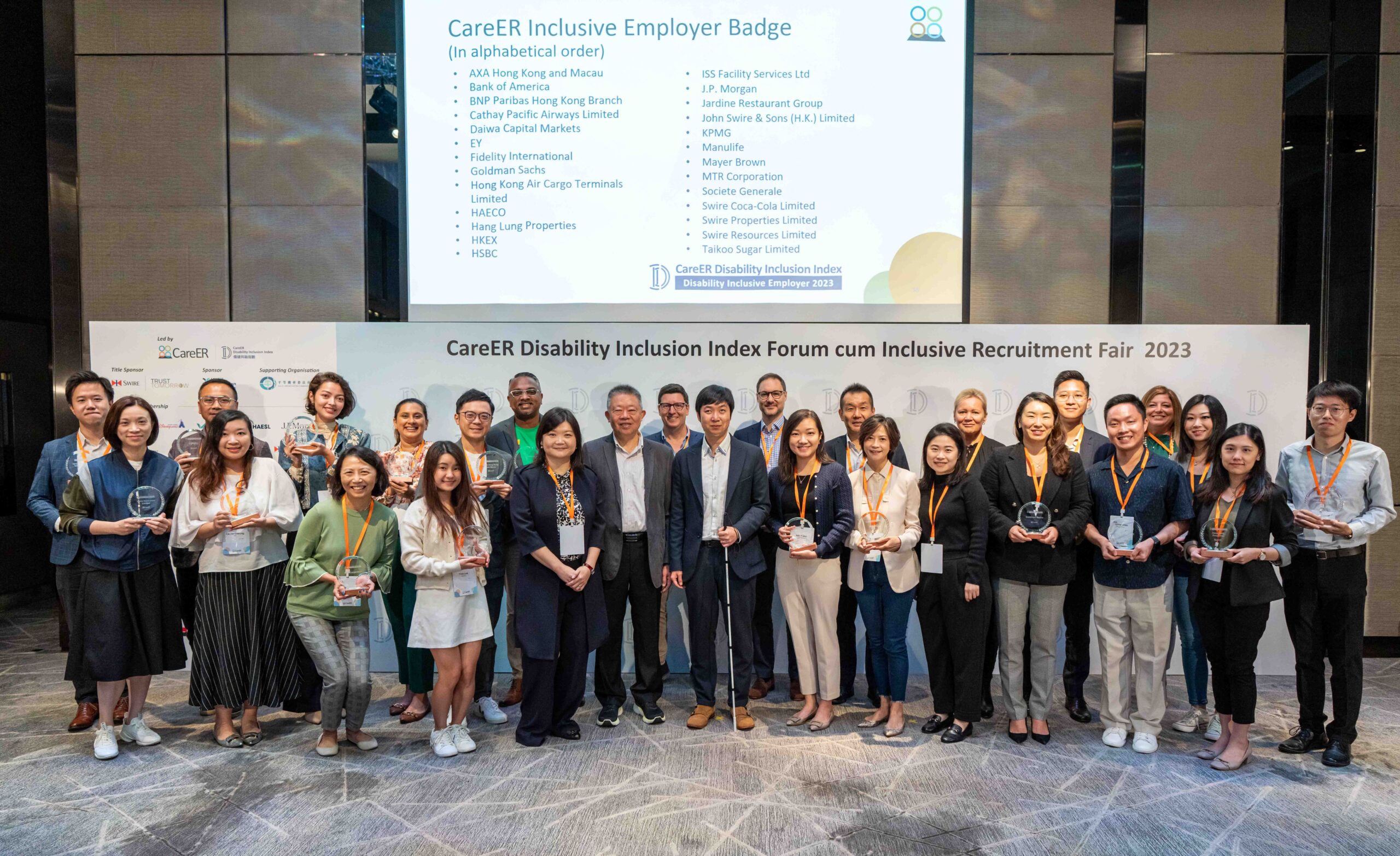 Group photo of 26 Employer Badge recipients of 2023